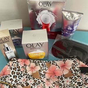Olay retinol skincare. Makeup bag and facial cleansing device included